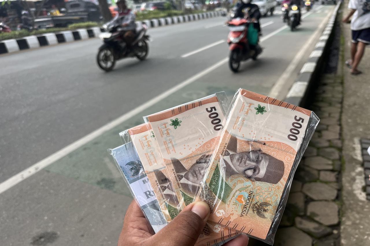 kejar-kejaran_dengan_satpol_pp,_jasa_tukar_uang_lebaran_di_samarinda_tak_kunjung_hilang1_IMG_9264.jpeg
